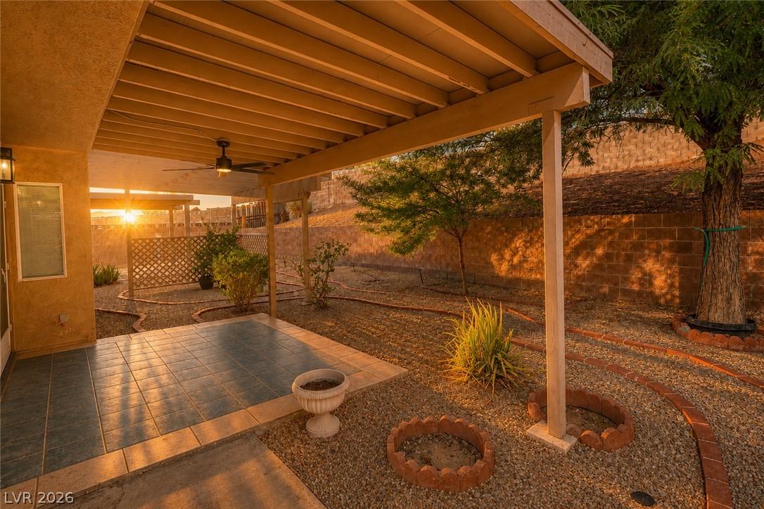 Image 3: A spacious covered patio provides a delightful out