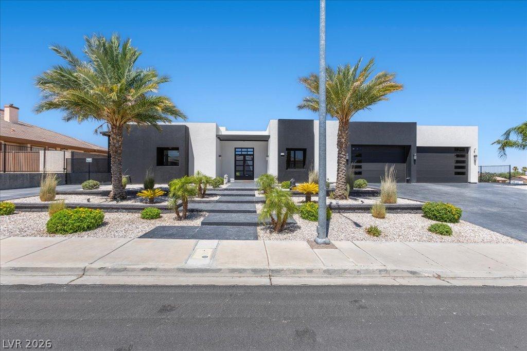Image 1: A striking modern facade with contrasting black an