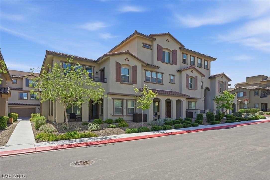 Image 4: A gracefully designed multi-story residence boasts