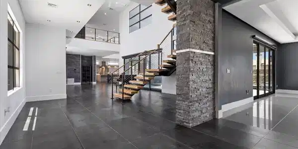 Image 4: A grand entrance welcomes with a floating staircas