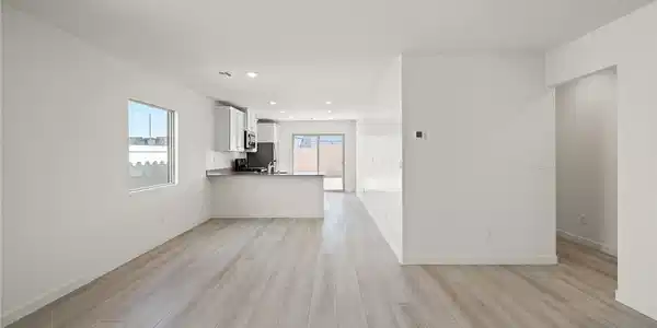 Image 3: An open floorplan seamlessly connects the airy liv