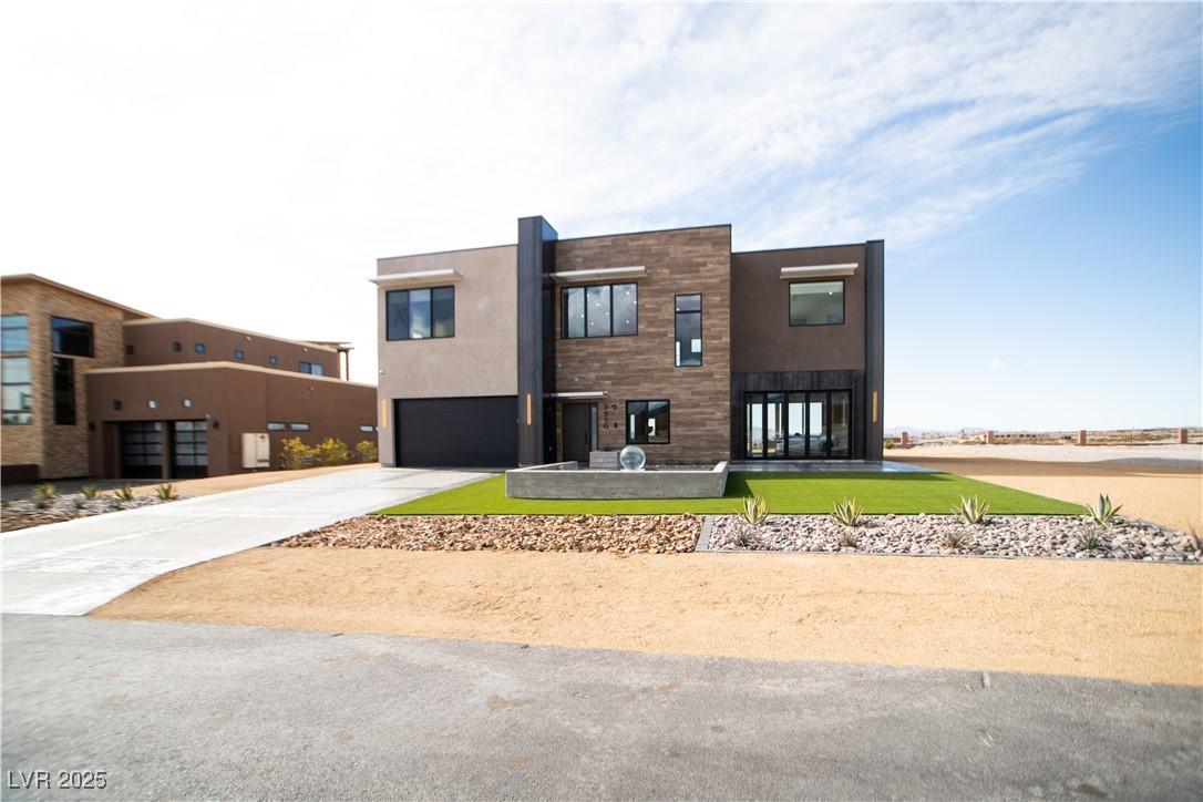 Image 4: Contemporary home with a garage