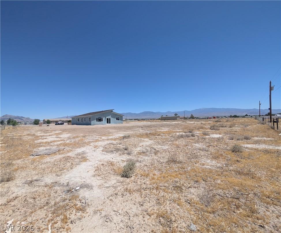 Image 3: Perched atop a sprawling lot, a single-story struc