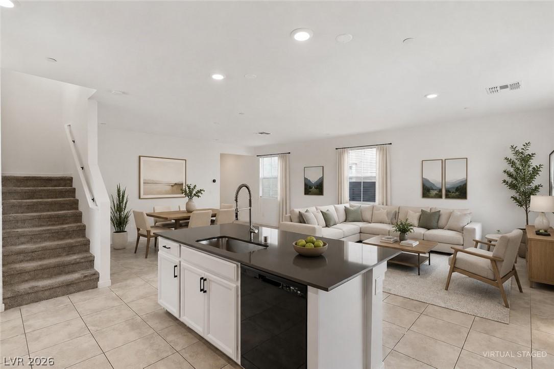Image 4: An open-concept living space integrates a modern k