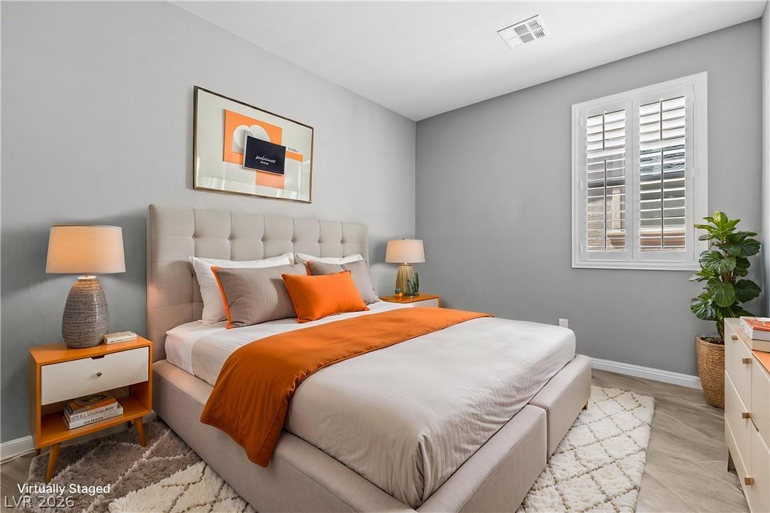 Image 4: 2nd Bedroom Relaxation awaits in this inviting pri