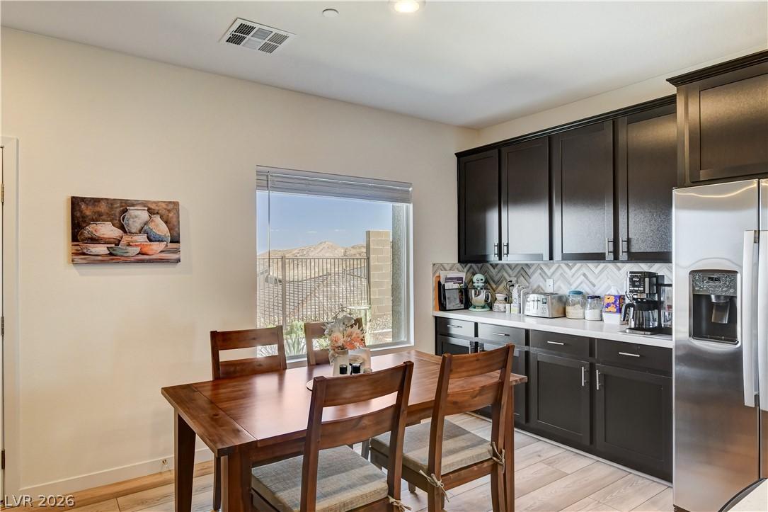 Image 4: This dining area with a mountain view offers a per