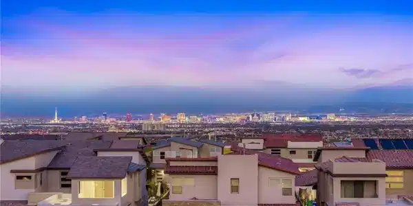 Image 2: City lights twinkle across the horizon, complement