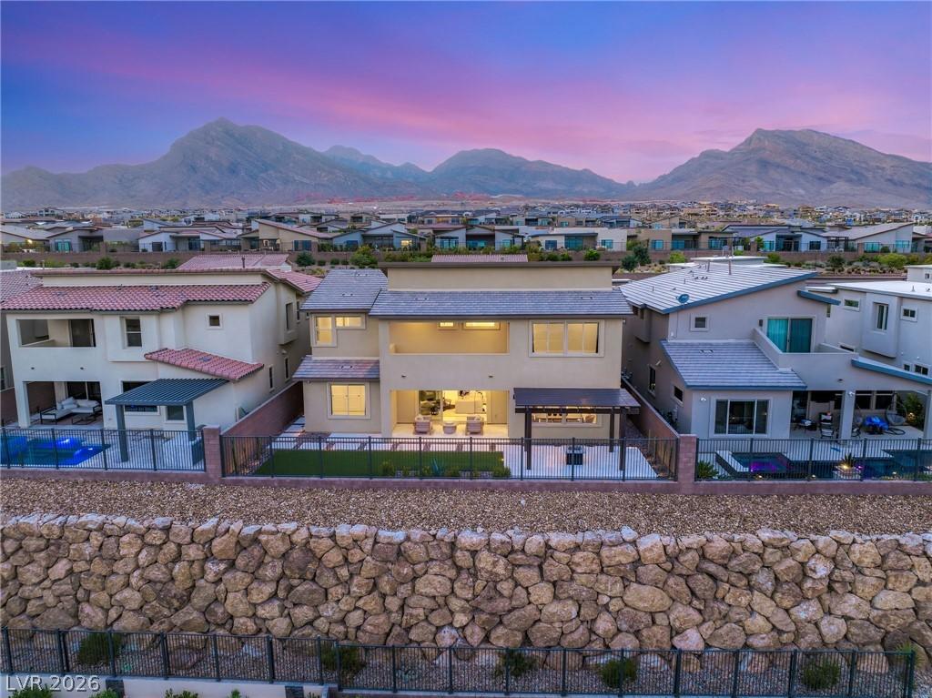 Image 3: Dramatic mountain vistas frame this home's private