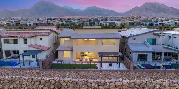 Image 3: Dramatic mountain vistas frame this home's private