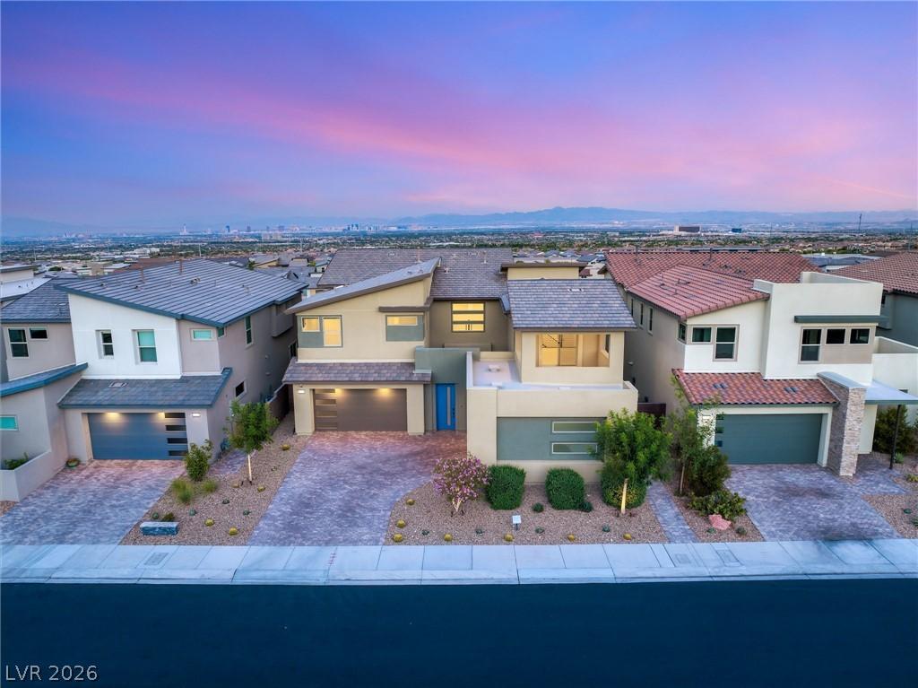 Image 4: Showcasing contemporary architecture, this home bo