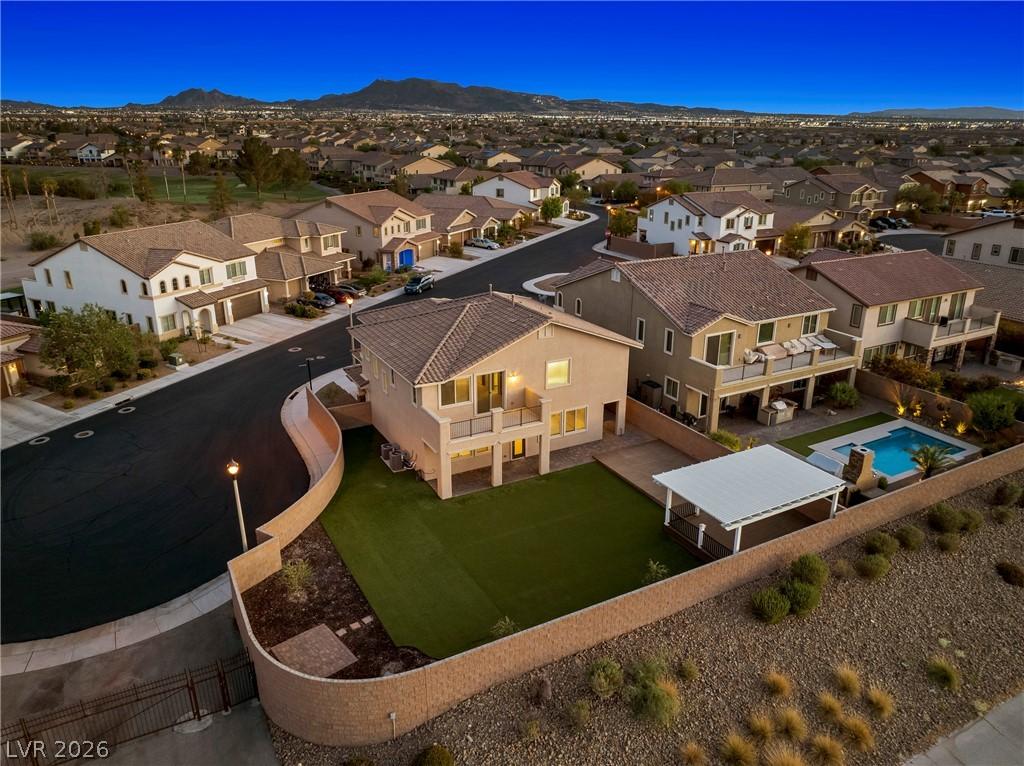 Image 3: An aerial panorama reveals a serene residential co