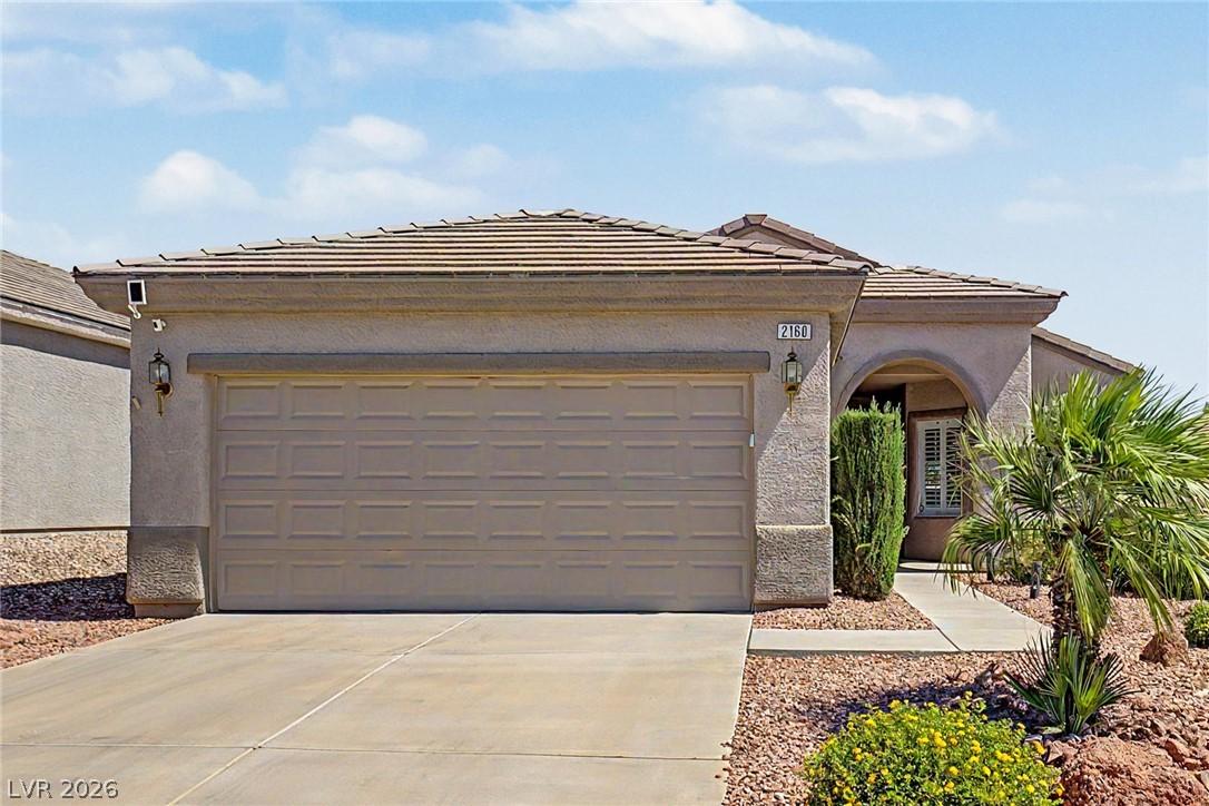 Image 2: A desert-friendly landscape surrounds this invitin