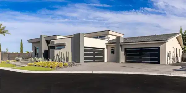 Image 2: Bold geometric architecture with smooth stucco fin