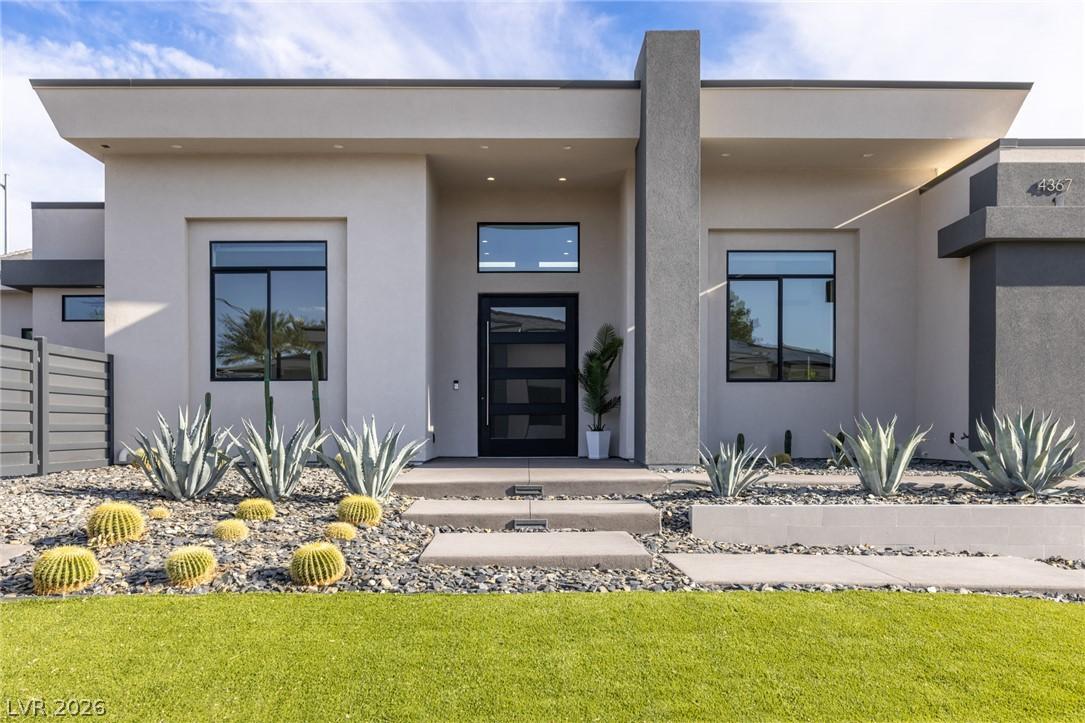Image 4: Modern desert architecture with clean lines and a