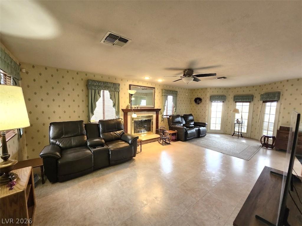 Image 4: A traditional living room offers a warm ambiance w