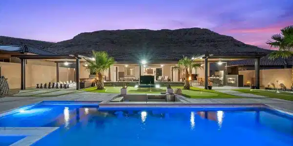 Image 2: Dramatic mountain views provide a breathtaking bac