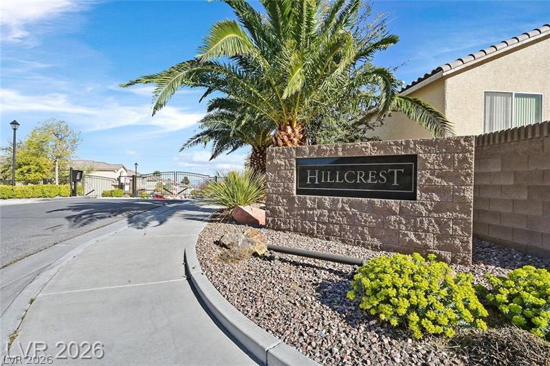 Image 2: An inviting gated community entrance features a "H