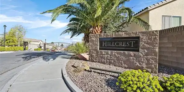 Image 2: An inviting gated community entrance features a "H