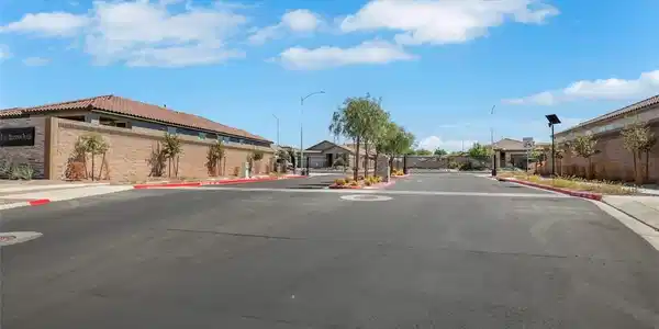 Image 4: Secure gated entry welcomes residents home along m