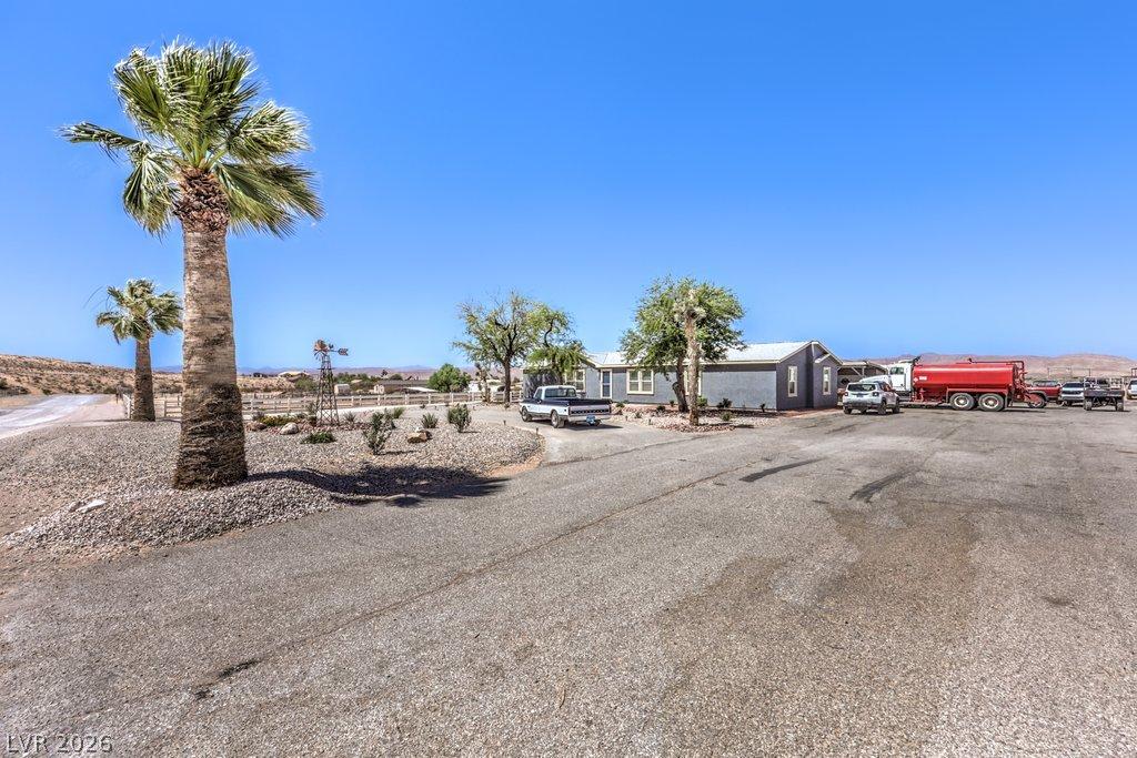 Image 2: Palm trees accent a sprawling rural property with