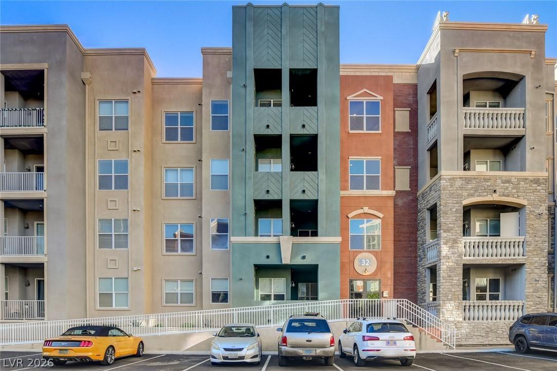 Image 4: Multi-story condominium building featuring a harmo