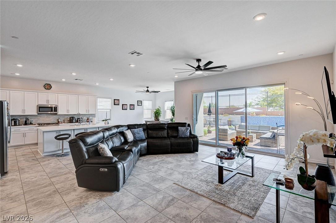Image 4: This bright great room features an open layout, id