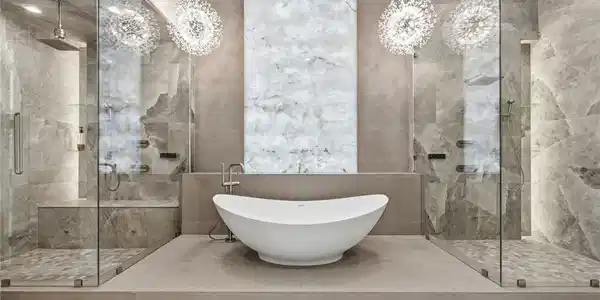 Image 3: Spa-inspired primary bath featuring dual walk-in s