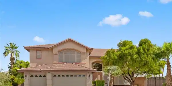 Image 2: An inviting exterior displays classic desert lands