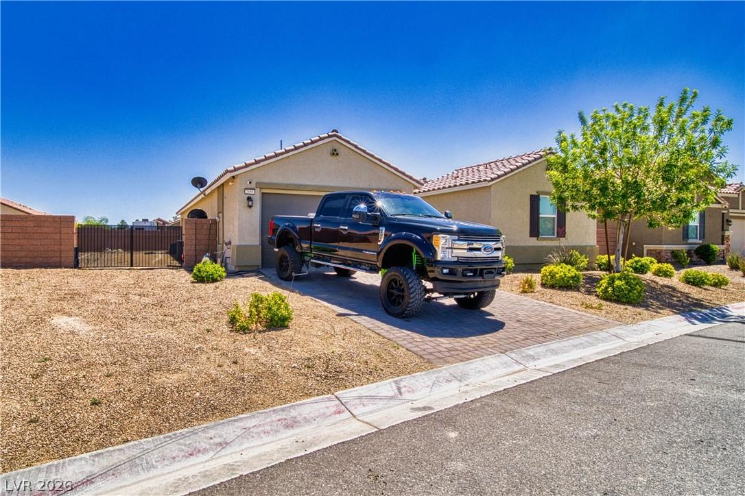 Image 3: A well-maintained single-story residence with a br