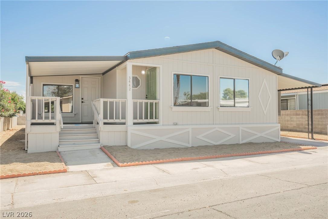 Image 4: This charming home offers comfortable living with