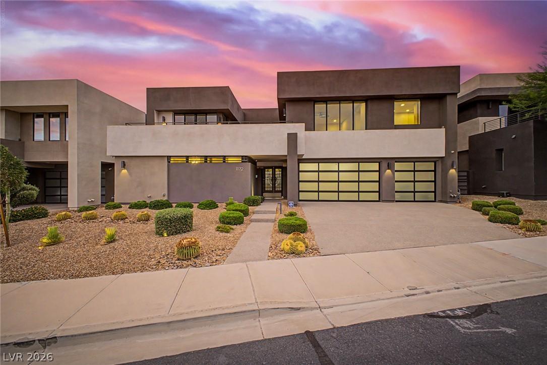 Image 1: A striking modern facade with ample natural lighti