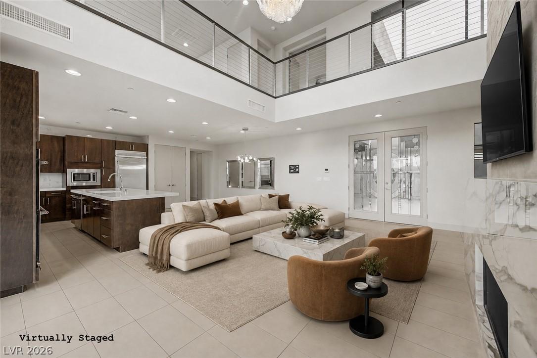 Image 2: Virtually Staged. An open-concept living space wit