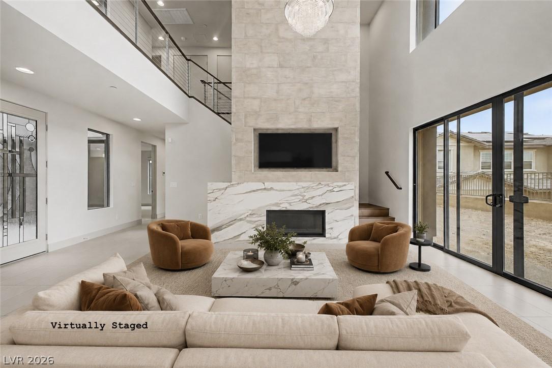 Image 3: Virtually Staged. A grand living space features a
