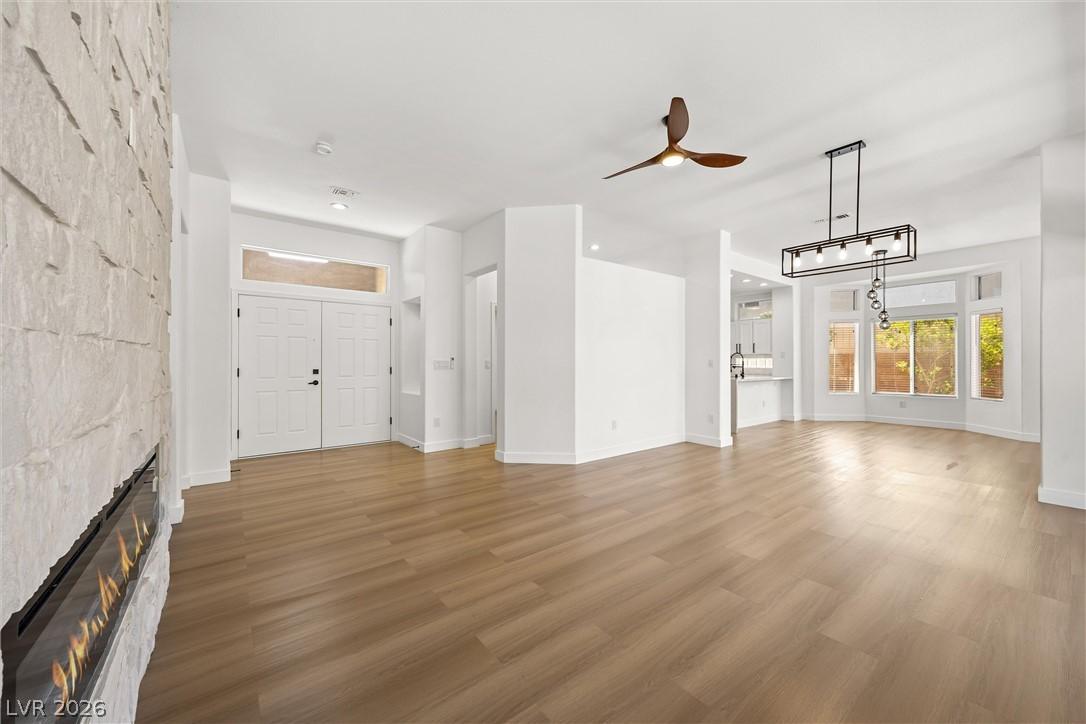 Image 3: Enter into a vast living area showcasing a contemp