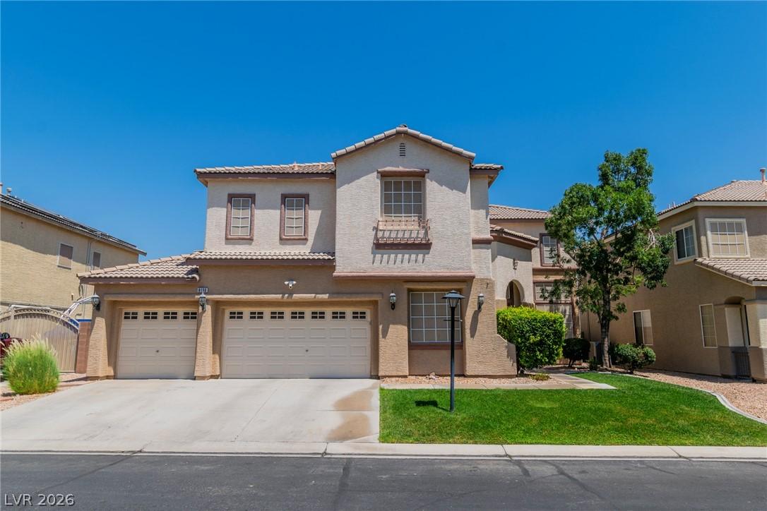 Image 2: A classic stucco home with an inviting front lawn