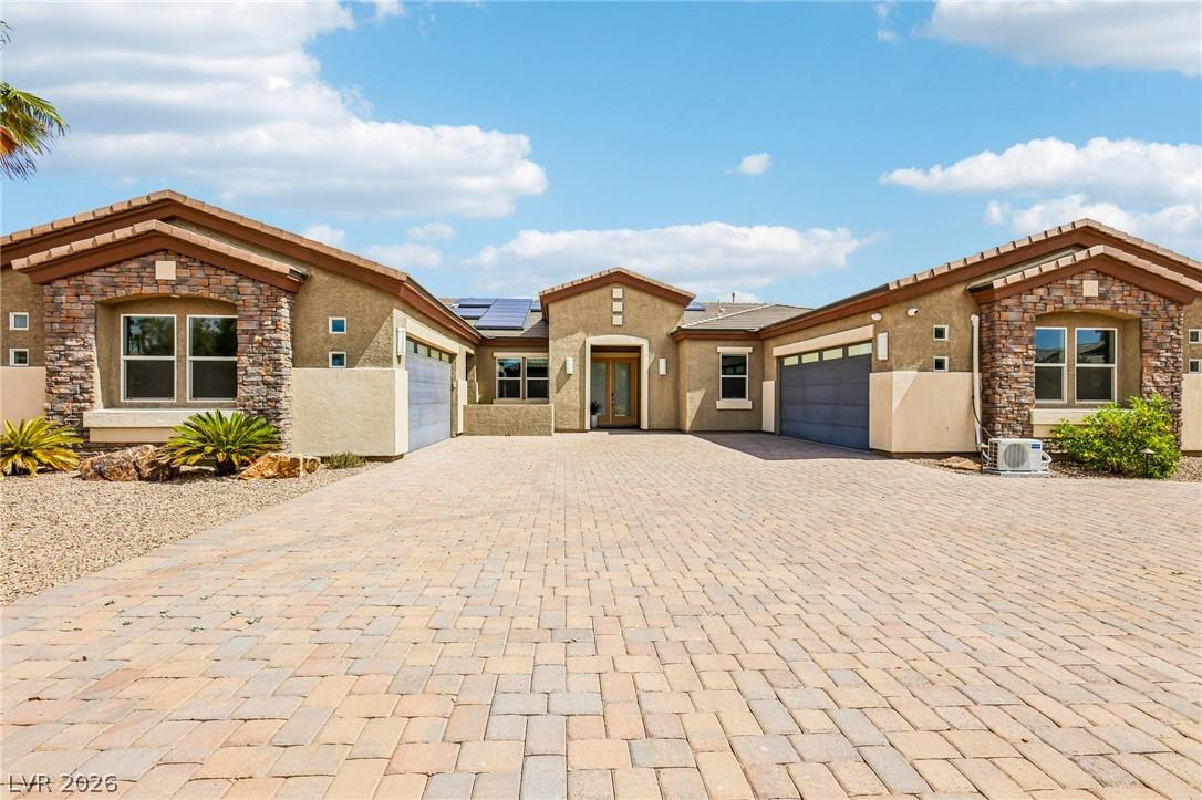 Image 1: Elegant brick driveway welcomes you to this sophis