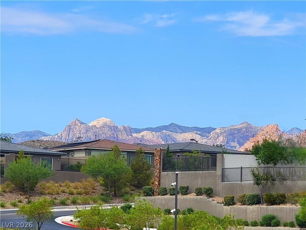 Image 3: Dramatic mountain views provide a breathtaking bac