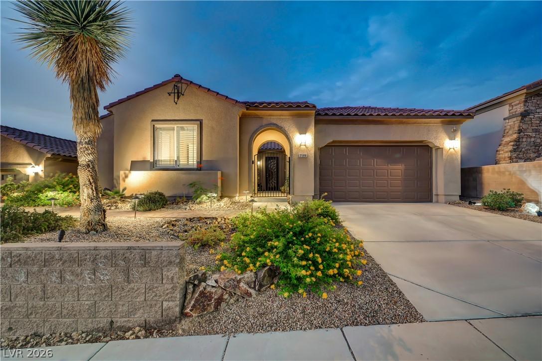 Image 1: This charming home with private courtyard perched