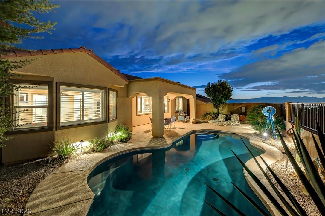 Image 2: Large pool with mountain/city views and no one beh