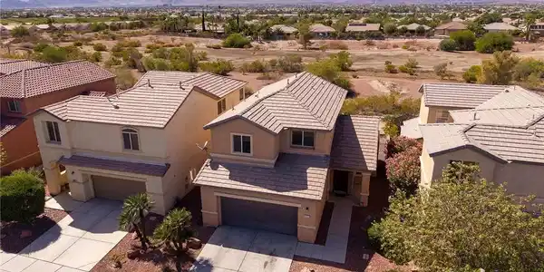 Image 2: Distant mountains frame this residential neighborh