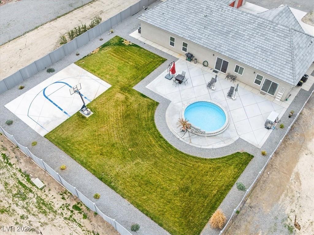 Image 2: View from above of property featuring a pool area