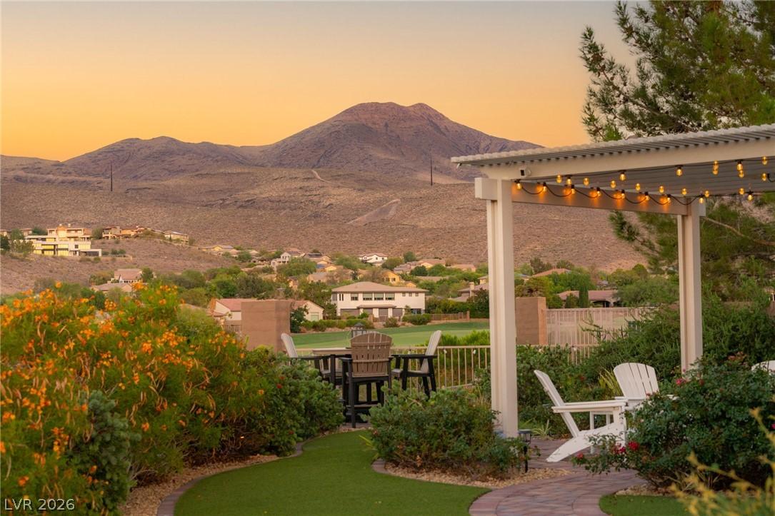 Image 4: A tranquil outdoor living space boasts panoramic g