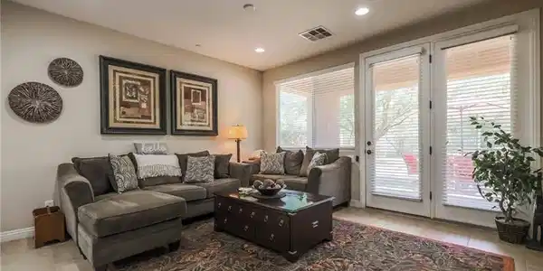 Image 4: Recessed lighting and tile floors define this comf