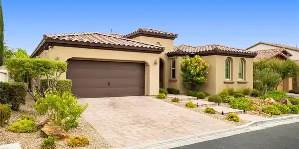 Image 2: Spanish tile roofing and custom paver driveway enh