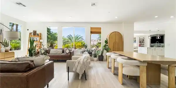 Image 4: Natural light floods this inviting living space, o