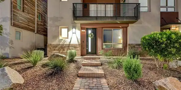 Image 2: Modern architecture and tiered landscaping elevate