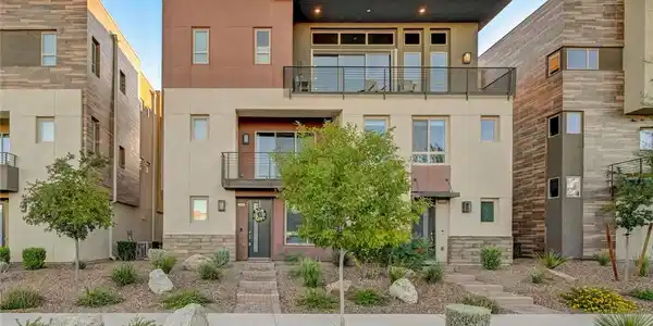 Image 3: A striking modern facade with multiple balconies a