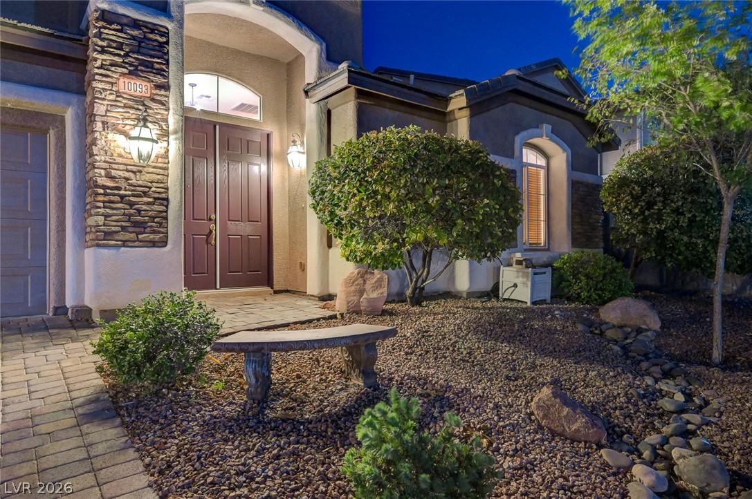 Image 4: An inviting stone pathway guides to a stately doub