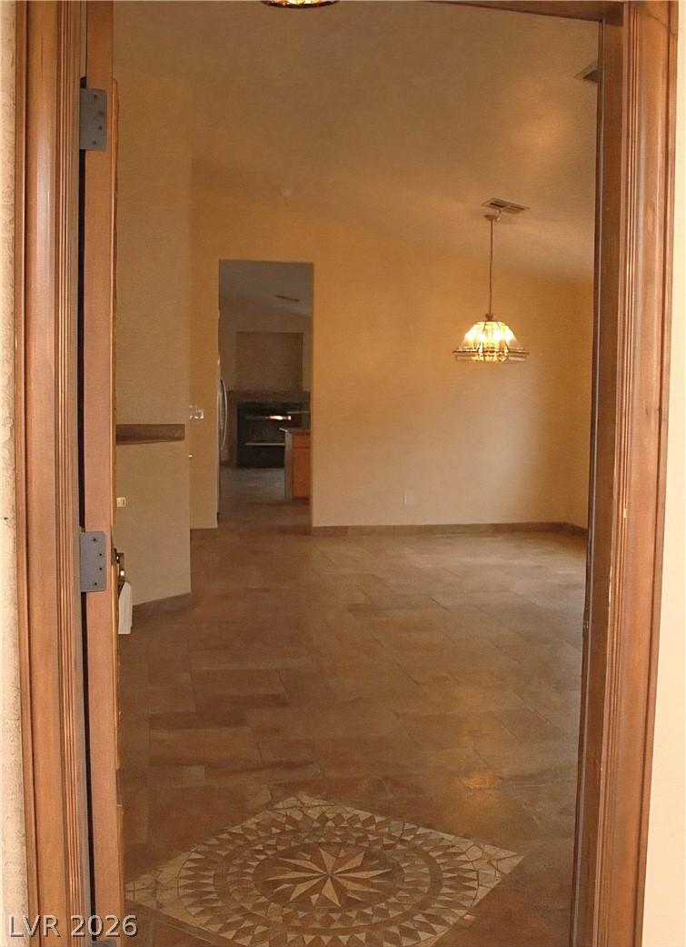 Image 4: Step through the welcoming entry to discover spaci
