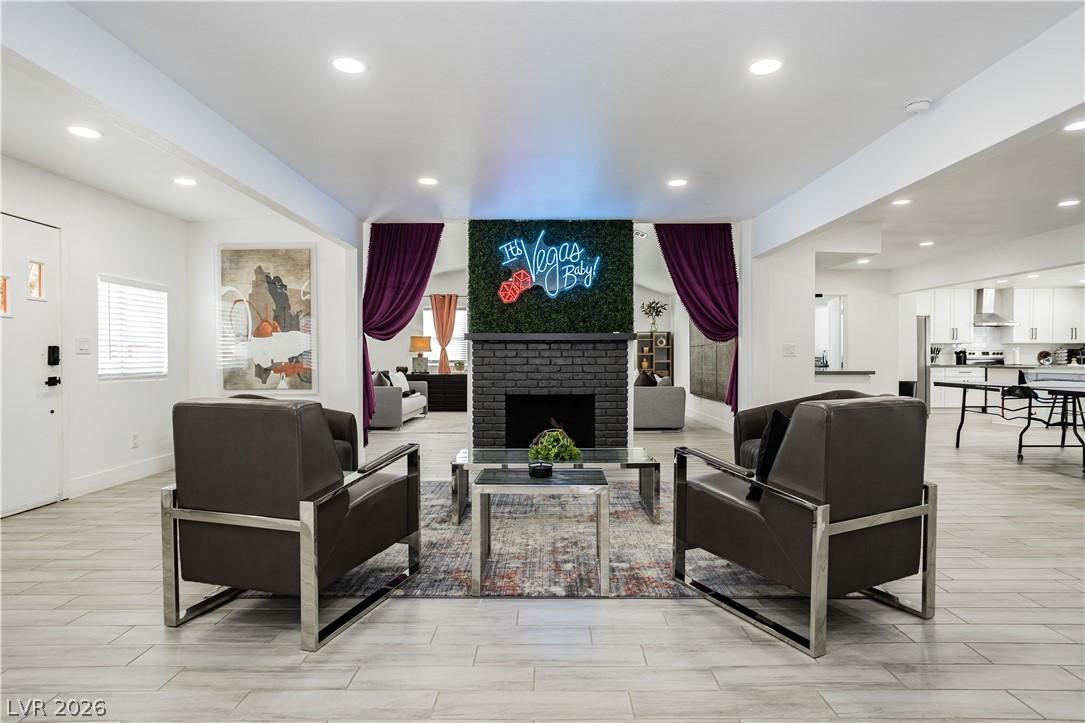 Image 4: A vibrant living space with a distinct fireplace f
